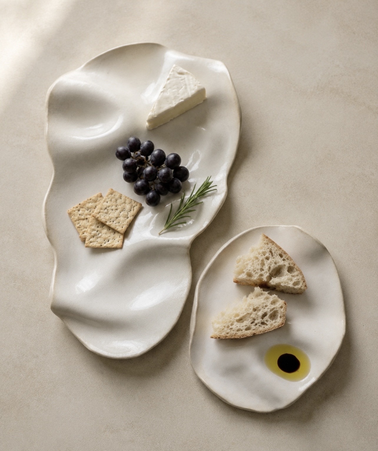 Organic handmade platters served with bread, cheese and grapes